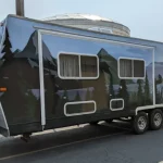 Camp Trailer with a personal color wrap of mountain scene