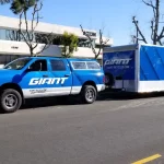 Commercial Vehicle Wrap Giant matching pickup and enclosed trailer