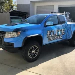 Bright blue Commercial Vehicle Wrap Elite Rooter on Chevy pickup