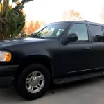 Personal Color Wrap in Black on Ford SUV